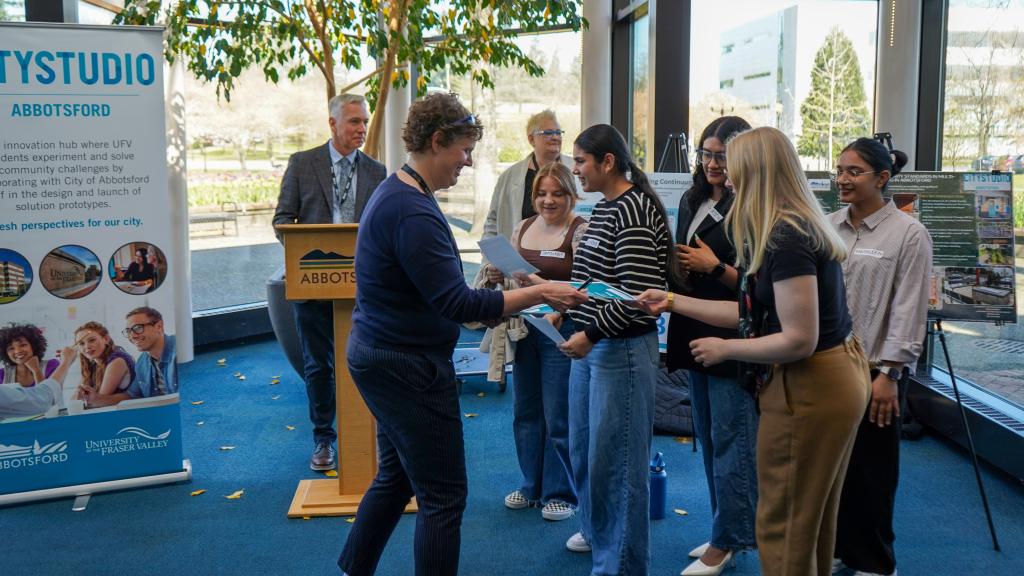 Mayor Siemens announcing the award winners at the 17th CityStudio Hubbub on April 9.