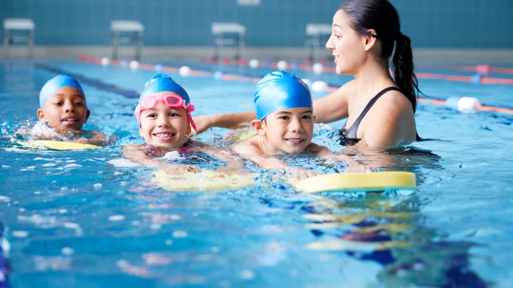people swimming in a pool