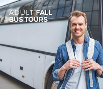 young man in front of bus