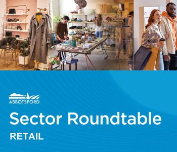 Shoppers browsing clothing and accessories at Abbotsford retail sector roundtable event in a local store.