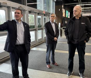 Abbotsford Canucks Chief Operating Officer Jim Kozak leads City staff and Councillors on a tour of Rogers Forum as part of the City’s Business Spotlight series while Councillors Gibson and Loewen look on.